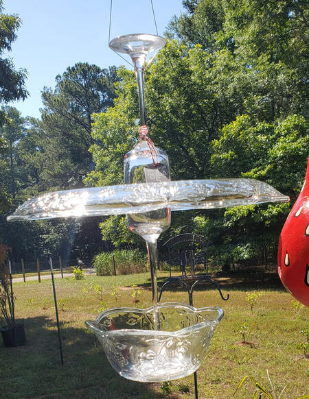 Made with Stainless Steel Jewelry Wire that has a 40lb breaking point. *All of our garden art and repurposed glass pieces are made with industrial all weather adhesive. *To protect the glass, we still suggest that you bring your glass pieces in during